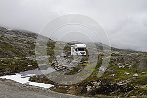 Camping holidays car on the mountain road, summer in norway