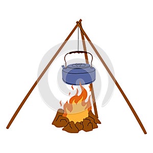 Camping kettle hanging over open fire