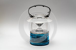 Camping lantern isolated on a gray background