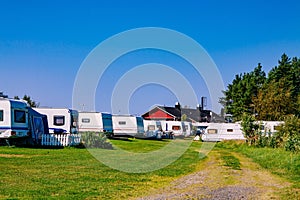 Camping life with caravans in nature park