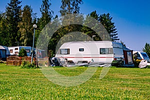 Camping life with caravans in nature park