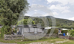 Camping life with trailers in Alpine nature park