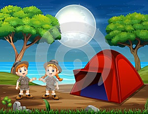 Camping night scene with two scouts
