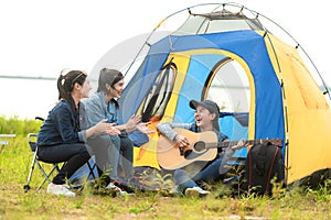 Camping outdoor. Group friends camping leisure and destination travel. Family sitting around camp