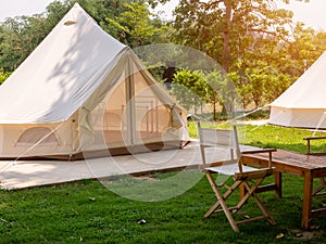 Camping picnic tent campground in outdoor hiking forest. Camper while campsite in nature background at summer trip camp. Adventure