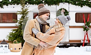 Camping Romance. Affectionate Young Couple Hugging And Having Fun During Winter Day