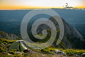 Camping with a tent on the Mountain peak on the Apuan Alps Alpi Apuane, Tuscany, Lucca photo