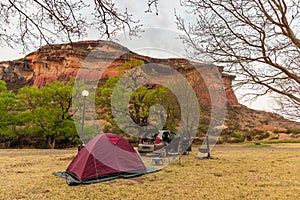 Camping beside scenic cliffs and landscape at the majestic Golden Gate Highlands National Park, famous travel destination in South