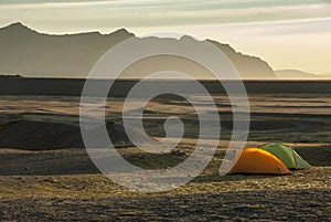Camping during sunrise in Icelandic wilderness