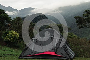 Camping tent against the mountains in Farallones de Cali, Colombia
