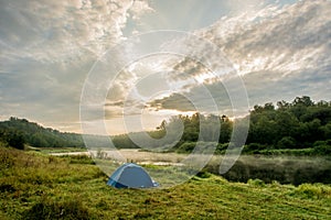 Camping tent on the Bank of the river Volga.
