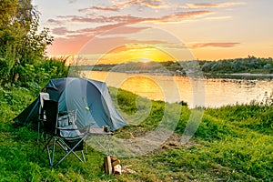 Camping tent in a camping in a forest by the river