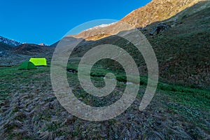 Camping Tent in Chitkul Trek - Landscape of Sangla Valley, Himachal Pradesh, India / Kinnaur Valley