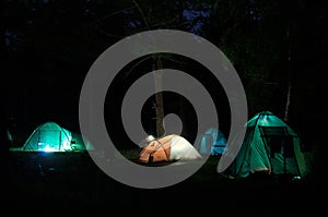 Camping Tent in forest at summer night. Siberia