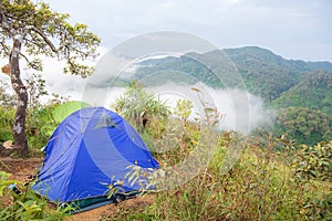 Camping tent on the hill of mountain forest at `LerGuaDa` or `Ler Gwa Dor` Tak province, Thailand, Asia. photo