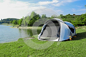Camping Tent on the lake sunny day