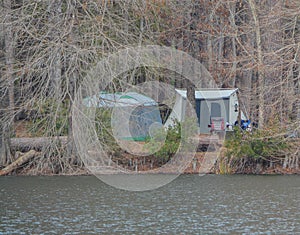 Camping in a tent on Ratcliff Lake in Davy Crockett National Forest, Texas photo