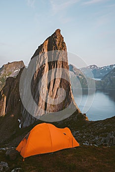 Camping tent and Segla mountain nature landscape in Norway