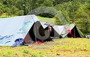 Camping tents in a scout camp and drying laundry out