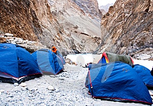 Camping tents setup on river bank. Chadar trek. Leh Ladakh. India