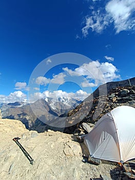 Camping on the top of Barrhorn above most of the glaciers like Brunegg glacier and Weisshorn in Swiss Alps, Wallis, Switzerland