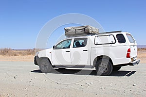 Camping Toyota Hilix 4WD roof tent desert, Namibia