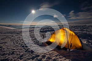 Camping during winter hiking in Carpathian mountain