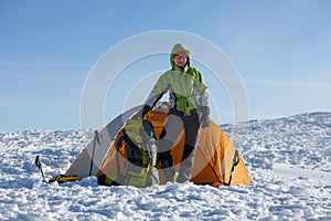 Camping during winter hiking in Carpathian mountains