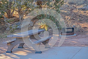 Campsite with a fire pit and picnic table at Fool Hollow Lake in Show Low, Navajo County, Apache Sitgreaves National Forest, Arizo