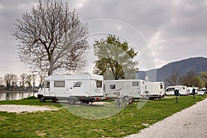 A campsite for RVs at the bank of the river Danube opposite the town Duernstein. Lower Austria.