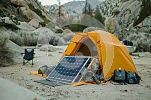 Campsite with solar panel powering equipment in wilderness