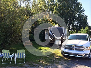 Campsite travel trailer pick up truck summer