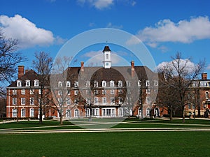 Campus building, blue sky and tree