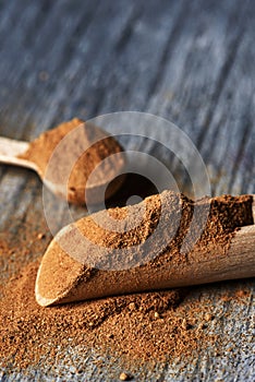 Camu-camu powder in some wooden spoons photo