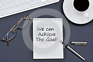 We can achieve the goal. Text on notebook