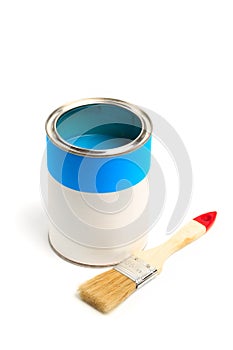 Can with blue paint with brush  isolated on white background