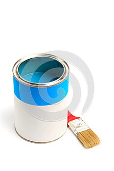Can with blue paint with brush  isolated on white background