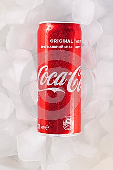 Can of Coca-cola on a bed of ice