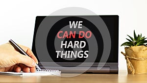 We can do hard things symbol. Concept words We can do hard things on beautiful black tablet. Beautiful white background.