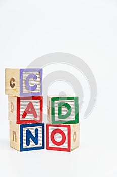 CAN DO word wooden block arrange in vertical style on white background and selective focus