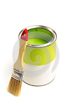 Can with green paint with brush  isolated on white background