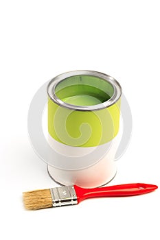 Can with green paint with brush  isolated on white background