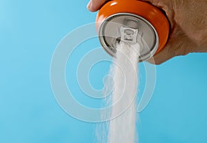 Can pouring sugar stream in calories content of soda energetic and refreshing drinks