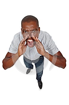 Can you hear me now. High angle shot of a young man shouting.