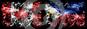 Canada, Canadian vs Philippines, Filipino New Year celebration sparkling fireworks flags concept background. Combination of two