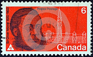 CANADA - CIRCA 1970: A stamp printed in Canada shows statesman Sir Oliver Mowat and Parliament, circa 1970.