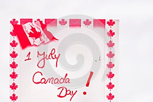 Canada day 1 July handwriting on paper with Canada flag. Writing text on memo post reminder. Bucharest, Romania, 2020