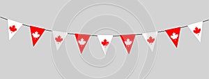 Canada Day decoration, flag of Canada, bunting garland, string of triangular flags for outdoor party, red maple leaf