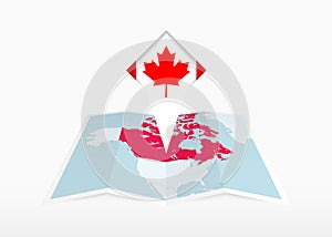 Canada is depicted on a folded paper map and pinned location marker with flag of Canada