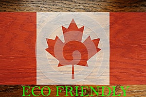 Canada flag on wooden background for global eco friendly environment, ecological and environmental saving and go green country